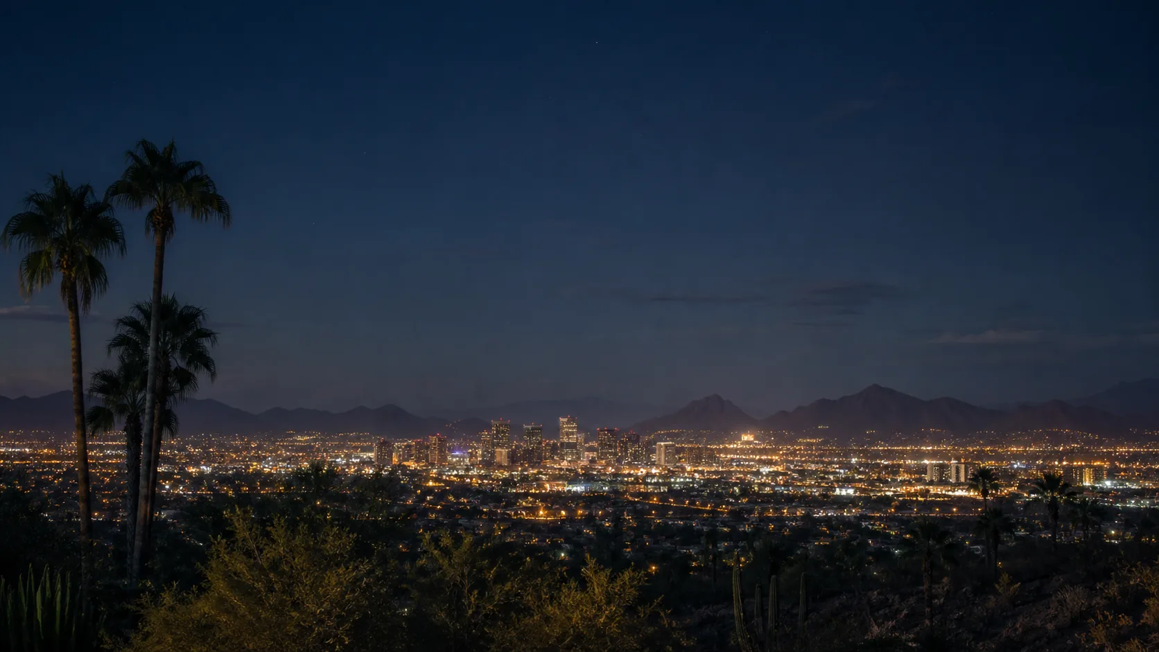 Phoenix city lights and the Sonoran Desert at night